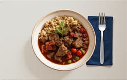 Sarapatel - Pork liver and blood stew with spices, served with brown rice