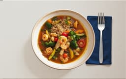 Moqueca Capixaba Accompanied by Brown Rice and Mixed Vegetables