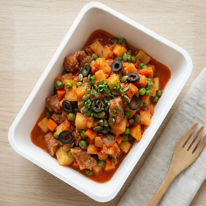 Latin pork stew with vegetables and pumpkin seeds
