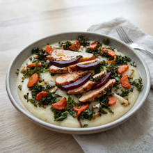 Pollo asado con verduras con harissa y puré de coliflor y patata