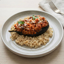 Berenjenas rellenas de lentejas y quinoa